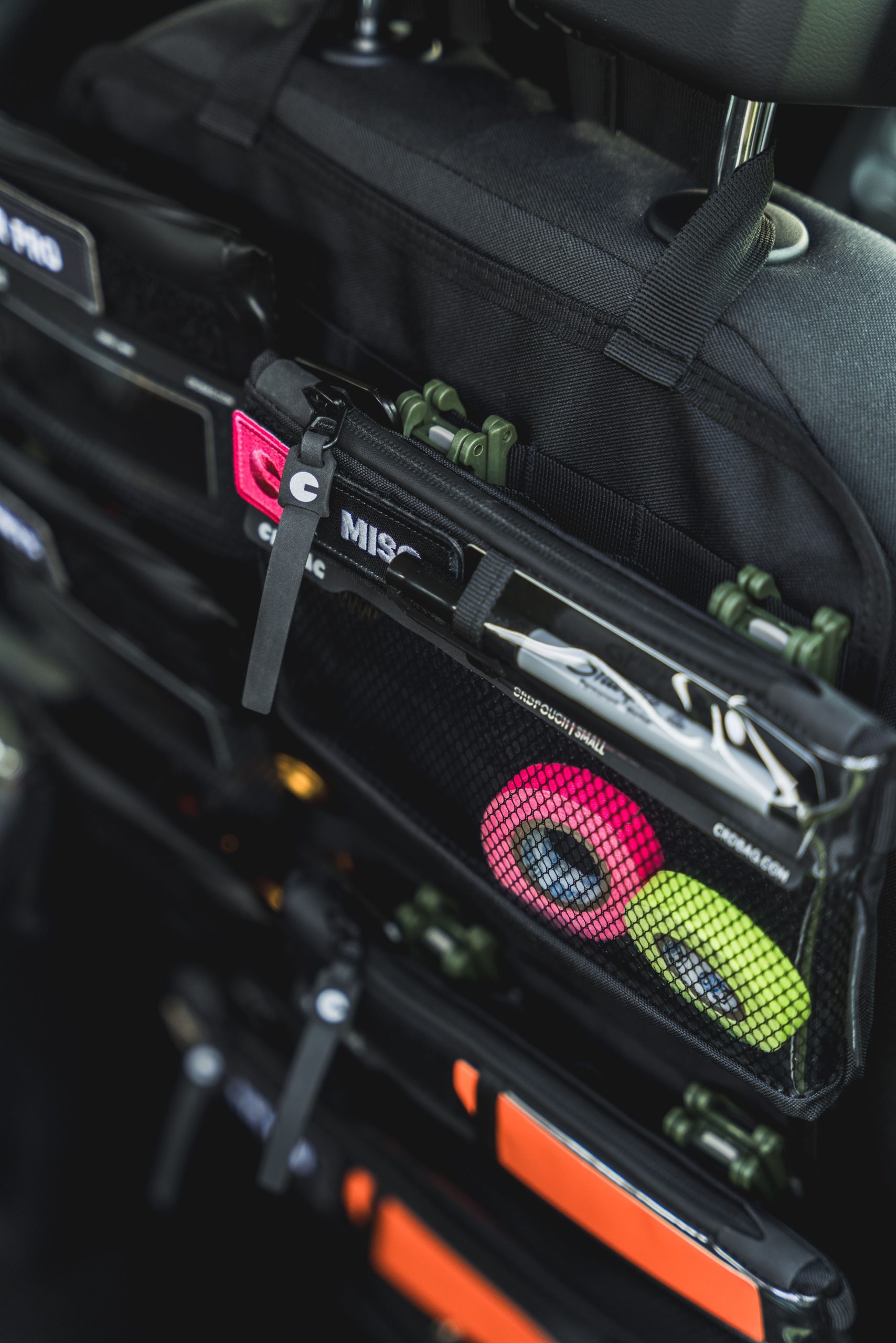 Vehicle interior organizer and seat back storage