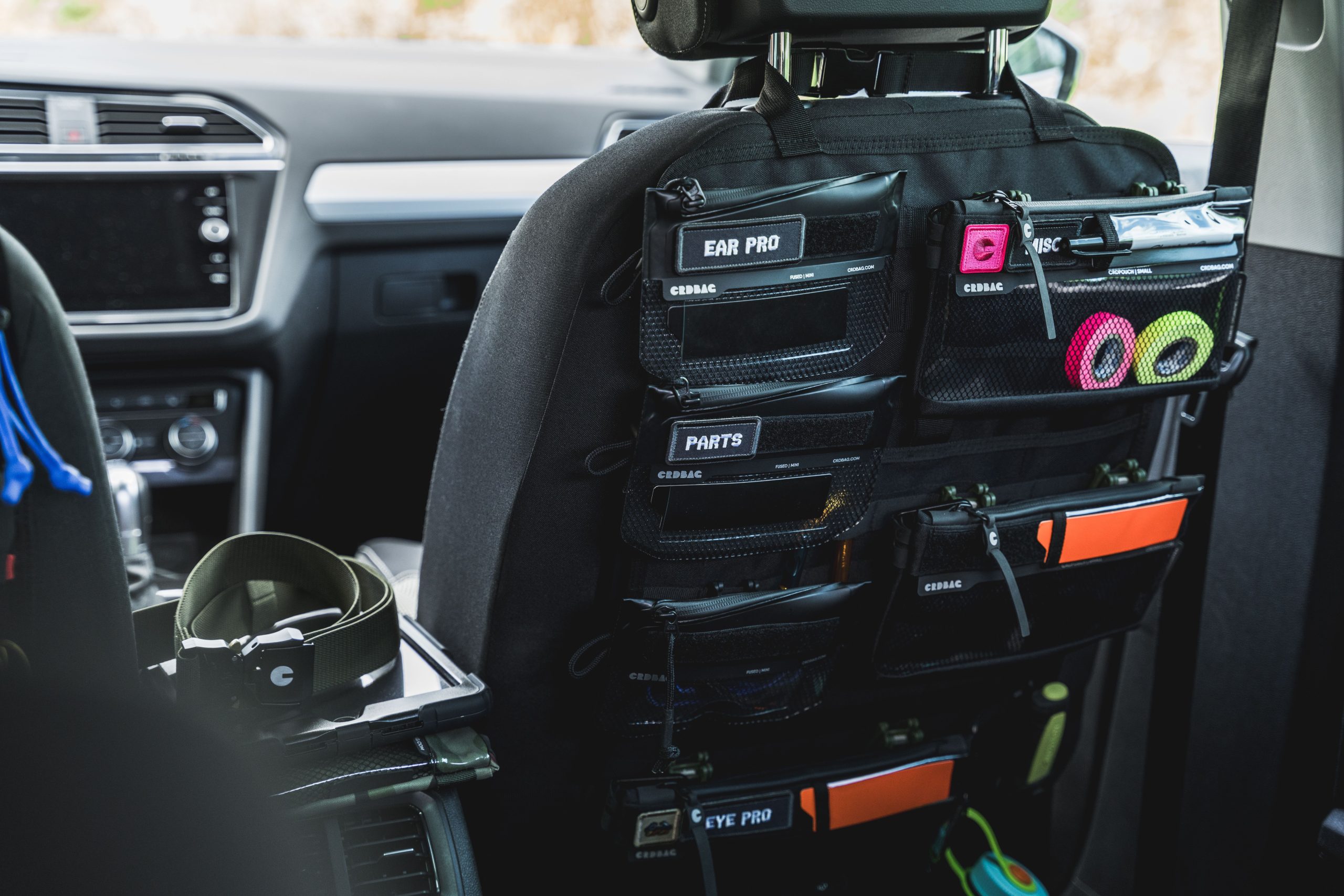 Modular vehicle gear organizer and MOLLE-style storage system