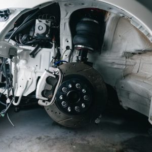 Automotive suspension system and chassis components