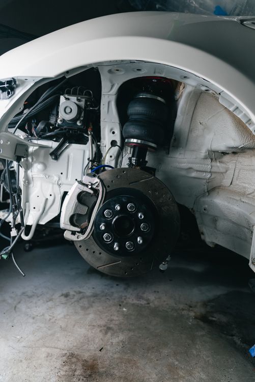 Automotive suspension system and chassis components